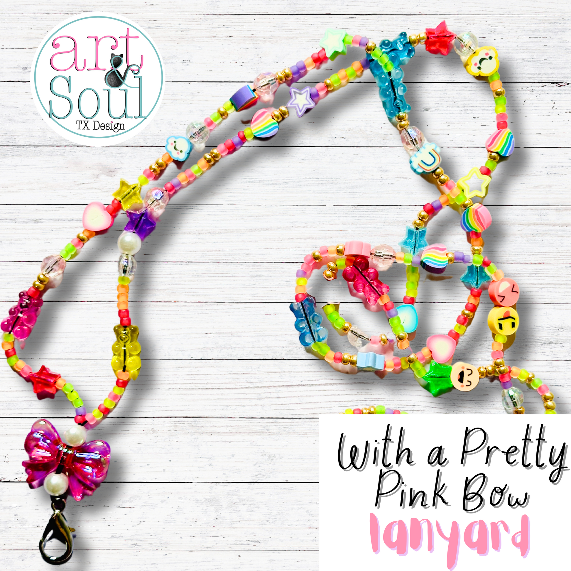 A second angle of the lanyard with a pretty pink bow near the ID and keychain holder and colorful stars, hearts, smiley faces, bears clouds, and other cute and fun beads.