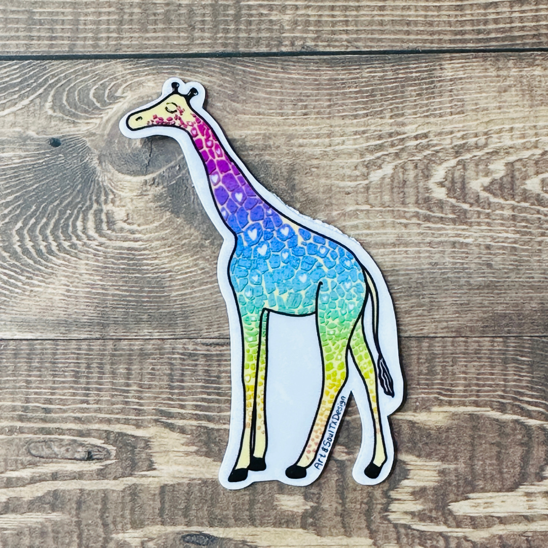 A tall full body giraffe (side profile) sticker on a brown wooded background. This giraffe has colorful spots from magenta, purple, blue, teal, green, and yellow spots along with a few white hearts of some the spots. The giraffe is standing tall with one eye closed.   